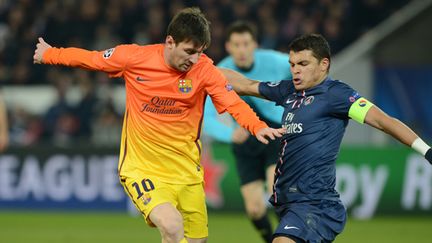 Thiago Silva au duel avec Leo Messi