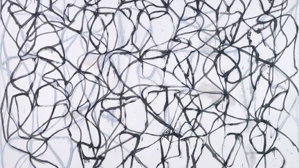 Après des œuvres monochromes dans les années 1960, Brice Marden (né en 1938), qui revendique l'influence de la calligraphie chinoise, crée dans les années 1980 des traits enchevêtrés en forme de grille, qu'il annule parfois en les recouvrant de peinture claire sous laquelle elles forment ce qu'il appelle des "figures fantômes". Ici, "Cold Moutain 6 (Bridge)", 1989-91 (San Francisco Museum of Modern Art, achat grâce à un don de Phyllis C. Wattis)
 (ADAGP, Paris 2015 © SFMOMA / photo Ben Blackwell)