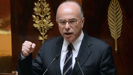 Bernard Cazeneuve, ministre de l'Int&eacute;rieur, &agrave; l'Assembl&eacute;e nationale, &agrave; Paris, le 16 juillet 2014. (PIERRE ANDRIEU / AFP)