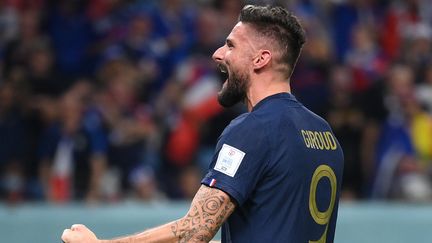 L'attaquant de l'équipe de France Olivier Giroud, après avoir marqué le quatrième but de la France lors du match de la Coupe du monde au Qatar entre la France et l'Australie au stade Al-Janoub, le 22 novembre 2022. (FRANCK FIFE / AFP)