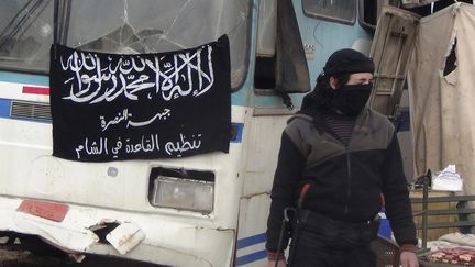 Un combattant du Front Al-Nosra dans les rues de Deraa (Syrie), le 26 d&eacute;cembre 2013. (REUTERS)