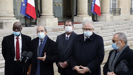 Des membres du CFCM à l'Elysée le 17 janvier 2021 pour la signature de la "Charte des principes" de l'islam de France (LUDOVIC MARIN / POOL)