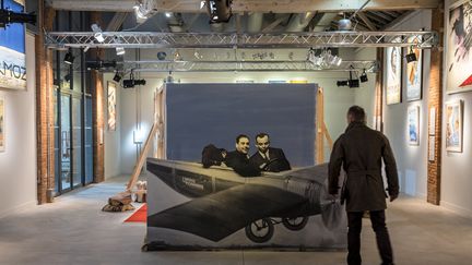 Un visiteur découvre l'espace muséal "L'Envol des pionniers" à Toulouse (18 décembre 2018)
 (Éric Cabanis / AFP)