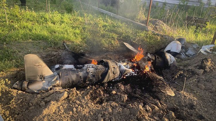 A photo from Ukrainian police showing debris from a missile shot down in the sky over kyiv on May 18, 2023. (UKRAINIAN POLICE PRESS OFFICE / AFP)