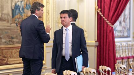 Le ministre de l'Int&eacute;rieur, Manuel Valls, lors du s&eacute;minaire de prospective &agrave; l'Elys&eacute;e, &agrave; Paris, le 19 ao&ucirc;t 2013. (REMY DE LA MAUVINIERE / AFP)