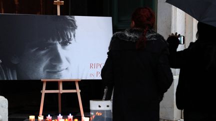 Un portrait d'Yvan Colonna présentée dans la cathédrale d'Ajaccio, le 2 mars 2023. (PASCAL POCHARD-CASABIANCA / AFP)