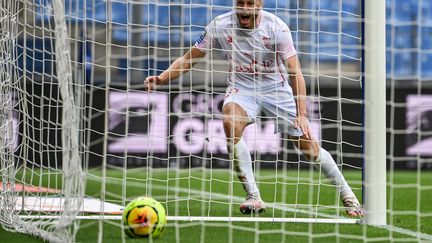 La joie du Nîmois Renaud Ripart, buteur salvateur face à Montpellier (PASCAL GUYOT / AFP)