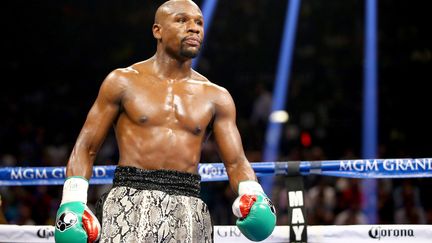 L'Am&eacute;ricain Floyd Mayweather, lors d'un combat &agrave; la MGM Grand Arena de Las Vegas (Etats-Unis), le 13 septembre 2014.&nbsp; (AL BELLO / GETTY IMAGES NORTH AMERICA / AFP)