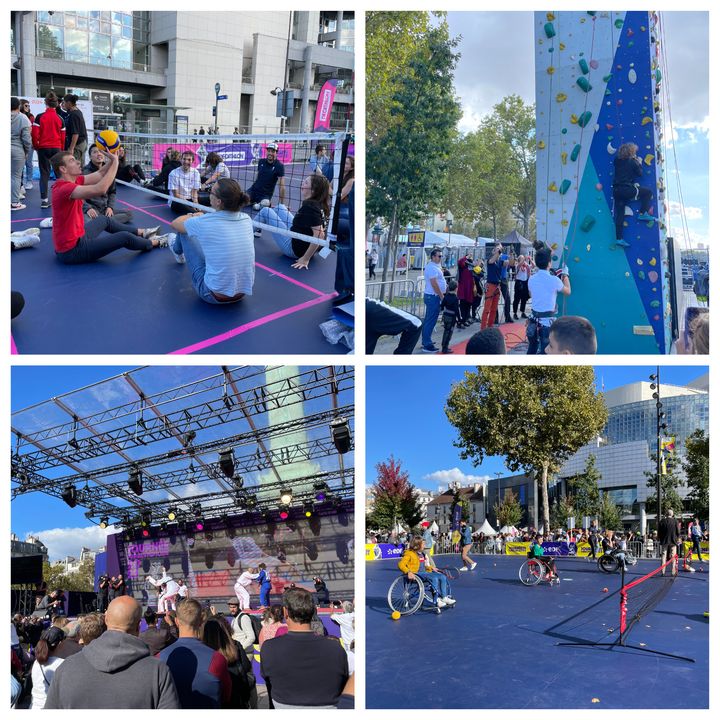 Des spectateurs de la journée paralympique s'initient au volley assis, à l'escalade ou au tennis fauteuil, tandis que sur la scène centrale, des démonstrations de para judo ont lieu, le samedi 8 octobre 2022 à Paris, sur la place de a Bastille. (Clément Pons / franceinfo: sport)