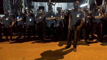 Des membres du collectif les 500 Frères contre la délinquance, le 25 mars 2017, à Cayenne (Guyane), lors d'un rassemblement. (JODY AMIET / AFP)