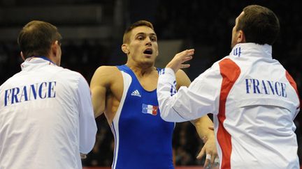 Steeve Guenot lors de sa médaille d'or en 2008 à Pékin (VANO SHLAMOV / AFP)