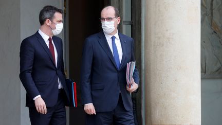 Jean Castex et Olivier Véran,&nbsp;à l'Elysée, le 10 mars 2021. (LUDOVIC MARIN / AFP)