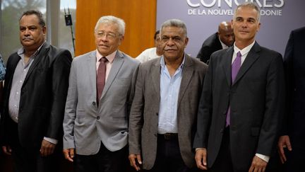 Les nouveaux membres du gouvernement de Nouvelle-Calédonie, le 17 février 2021, à Nouméa.&nbsp; (THEO ROUBY / AFP)