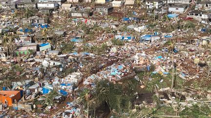 Vue aérienne d'un quartier rasé par le cyclone Chido à Combani (Mayotte), le 16 décembre 2024 (HANDOUT / SECURITE CIVILE)