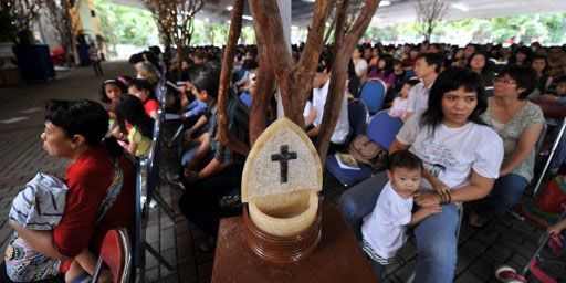 Chrétiens participant à la messe de Noël à Jakarta le 25 décembre 2011. (AFP - ADEK BERRY )