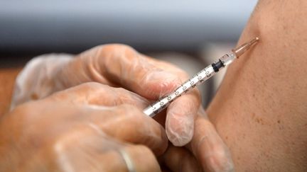 A person getting vaccinated against MPOX in Lille (North), August 10, 2022. (FRANCOIS LO PRESTI / AFP)