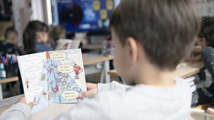 A little boy in a school near Poitiers (Vienna), April 11, 2024. (JEAN-FRANCOIS FORT / HANS LUCAS / AFP)