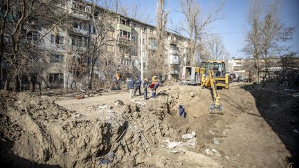 Damaged buildings after the explosion on Mykolaiv Highway 11, in Kherson, Ukraine, on March 9, 2024. (GIAN MARCO BENEDETTO / ANADOLU / AFP)