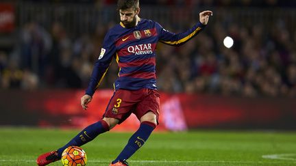 Gerard Piqué, défenseur du FC Barcelone, durant un match contre Celta Vigo à Barcelone (Espagne), le 14 février 2016. (GRUPPO / S. LAU / AFP)