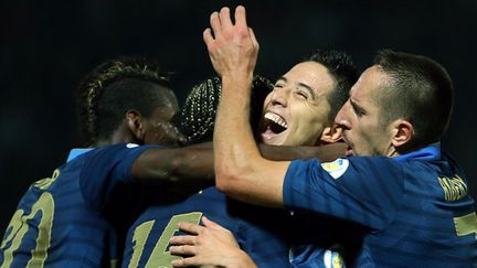 Nasri entouré de Pogba, Sagna et Ribéry (FRANCK FIFE / AFP)