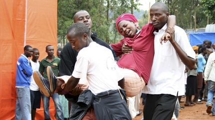 A Kigali (Rwanda), le 7 avril&nbsp;2009, lors du 15e anniversaire du g&eacute;nocide. (STR NEW / REUTERS )