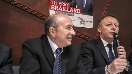 Le maire socialiste de Lyon, G&eacute;rard Collomb, et Thierry Braillard, candidat PRG dans la 1re circonscription du Rh&ocirc;ne, le 8 juin &agrave; Lyon. (JEAN-PHILIPPE KSIAZEK / AFP)