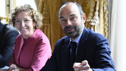 La ministre du Travail, Muriel Pénicaud, et le Premier ministre, Edouard Philippe, à Matignon, le 25 juillet 2017. (BERTRAND GUAY / AFP)