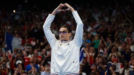 Ugo Didier peut savourer : après l'argent et le bronze glanés à Tokyo, le nageur tricolore a remporté son premier titre paralympique sur le 400 m nage libre (catégorie S9), jeudi 29 août lors des Jeux de Paris. (FRANCK FIFE / AFP)