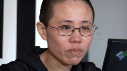 Liu Xia, épouse de Liu Xiaobo, chez elle à Pékin en février 2009
 (EyePress News / AFP)