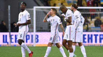 Lucas Digne, Presnel Kimpembé, Adrien Rabiot et Paul Pogba désorientés, l'image d'une équipe de France fragilisée défensivement, le 4 septembre en Ukraine. (GENYA SAVILOV / AFP)