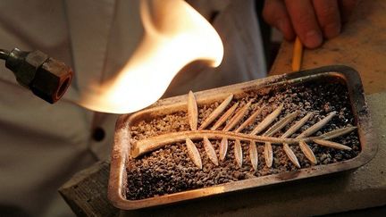 Palme d'or fabriquée par Chopard, édition 2007 dans les ateliers du joaillier
 (FABRICE COFFRINI / AFP)