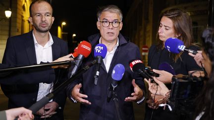 Manuel Bompard (LFI), Olivier Faure (PS) and Marine Tondelier (EELV) at the end of the Saint-Denis Meetings with the President of the Republic Emmanuel Macron, August 31, 2023. (LUDOVIC MARIN / AFP)