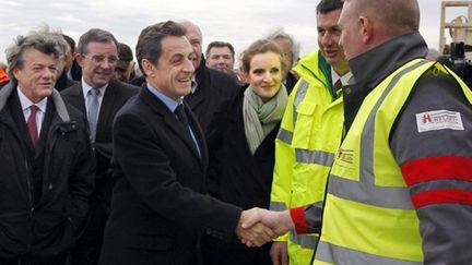 Nicolas Sarkozy, Jean-Louis Borloo et NKM visitent le site du canal Seine-Nord Europe à Licourt (5/4/2011) (AFP / Pascal Rossignol)