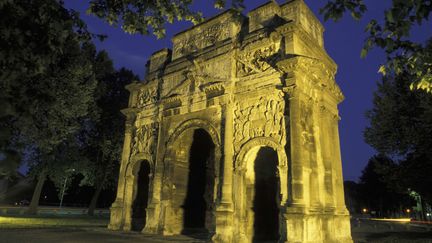 L'arc de triomphe d'Orange, construit entre 10 et 25, ainsi que le th&eacute;&acirc;tre antique sont des vestiges mil&eacute;naires de l'&eacute;poque romaine. (ROLLINGER-ANA / ONLY FRANCE / AFP)