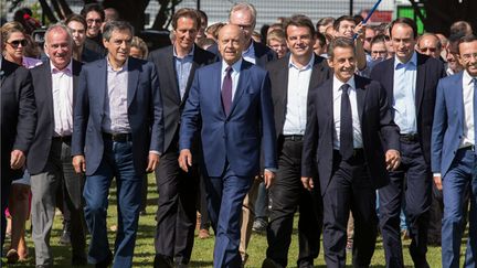 &nbsp; (François Fillon, Alain Juppé et Nicolas Sarkozy, trois candidats déclarés à la primaire, lors de l'université d'été des Républicains © Maxppp)