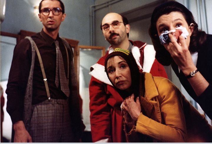 Pierre (Thierry Lhermitte), Félix (Gérard Jugnot), Zézette (Marie-Anne Chazel) and Thérèse (Anemone) during the film "Santa Clause is garbage" (Tinacra Films, 1982).  (PHOTO JEAN PIERRE FIZET / AFP)