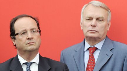 Fran&ccedil;ois Hollande et Jean-Marc Ayrault, le 12 mai 2009, &agrave; Paris. (STEPHANE DE SAKUTIN / AFP)