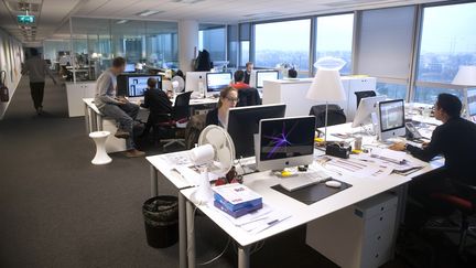 Cadres et employés se partagent un open-space. (BLOOMBERG / BLOOMBERG)