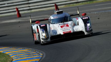 L'Audi n&deg;2&nbsp;pilot&eacute;e par Marcel F&auml;ssler, Beno&icirc;t Tr&eacute;luyer et Andr&eacute; Lotterer, a devanc&eacute; l'Audi n&deg;1 et la Toyota n&deg;8 dimanche 15 juin 2014, lors de la course des 24 Heures du Mans.&nbsp; (GUILLAUME SOUVANT / AFP)