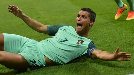 Le buteur portugais Cristiano Ronaldo, après avoir ouvert le score contre le pays de Galles en demi-finale de l'Euro-2016 (PAUL ELLIS / AFP)