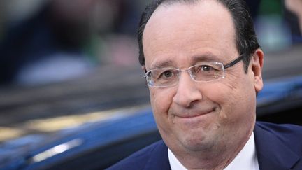 Fran&ccedil;ois Hollande &agrave; son arriv&eacute;e au sommet europ&eacute;en sur la D&eacute;fense &agrave; Bruxelles (Belgique), le 20 d&eacute;cembre 2013. (LIONEL BONAVENTURE / AFP)