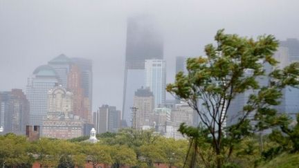 Irene a paralysé la métropole new-yorkaise, privé d'électricité des millions de foyers et abattu des milliers d'arbres. (Jemal Countess. Getty Images North America. AFP)