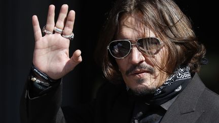 L'acteur américain Johnny Depp le 22 juillet 2020 arrive à l'audience&nbsp;du procès qui l'oppose au journal The Sun (TOLGA AKMEN / AFP)