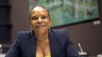 La ministre de la Justice, Christiane Taubira, avant son audition par la commission d'enqu&ecirc;te parlementaire sur l'affaire Cahuzac, &agrave; l'Assembl&eacute;e nationale, le 16 juillet 2013.&nbsp; (LIONEL BONAVENTURE / AFP)