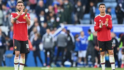 Les deux stars portugaises de Manchester United, Bruno Fernandes et Cristiano Ronaldo. (PAUL ELLIS / AFP)