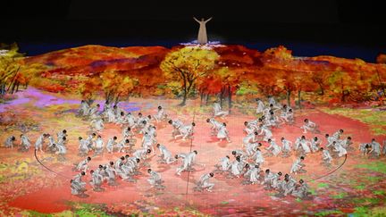 Plusieurs plateaux de la cérémonie d'ouverture des Jeux paralympiques de Pékin ont retenu l'attention, à l'image de cette chorégraphie sur peinture mettant en scène plusieurs enfants chinois en situation de handicap. (WANG ZHAO / AFP)