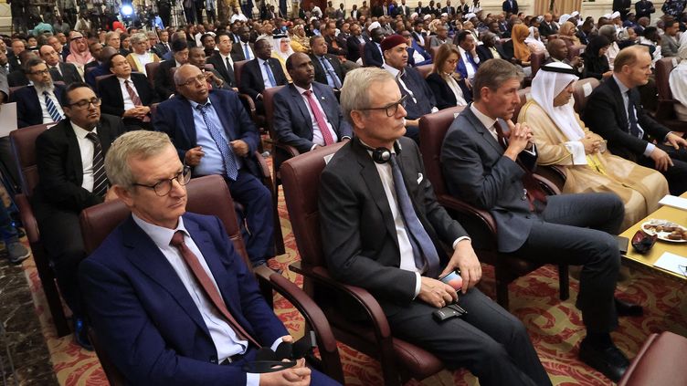 European Union Ambassador Aidan O'Hara (foreground, left) during an official ceremony in Khartoum, Sudan, on December 5, 2022. (ASHRAF SHAZLY / AFP)