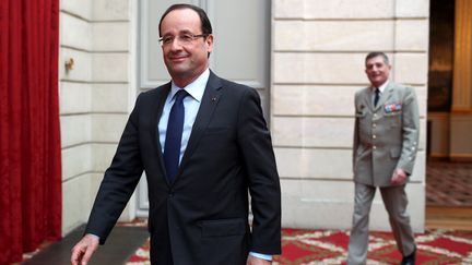 Le pr&eacute;sident de la R&eacute;publique, Fran&ccedil;ois Hollande, le 21 d&eacute;cembre 2012 &agrave; l'Elys&eacute;e, &agrave; Paris (France). (THIBAULT CAMUS / AFP )