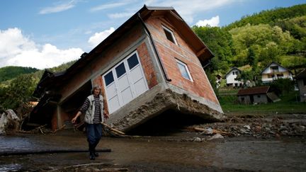 &nbsp; (La montée des eaux a provoqué d'énormes dégâts comme ici dans le village de Krupanj, en Serbie © Reuters - Marko Djurica)