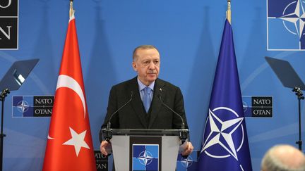 Le président turc, Recep Tayyip Erdogan, le 24 mars 2022 à Bruxelles pour un sommet de l'Otan. (MUSTAFA KAMACI / ANADOLU AGENCY / AFP)